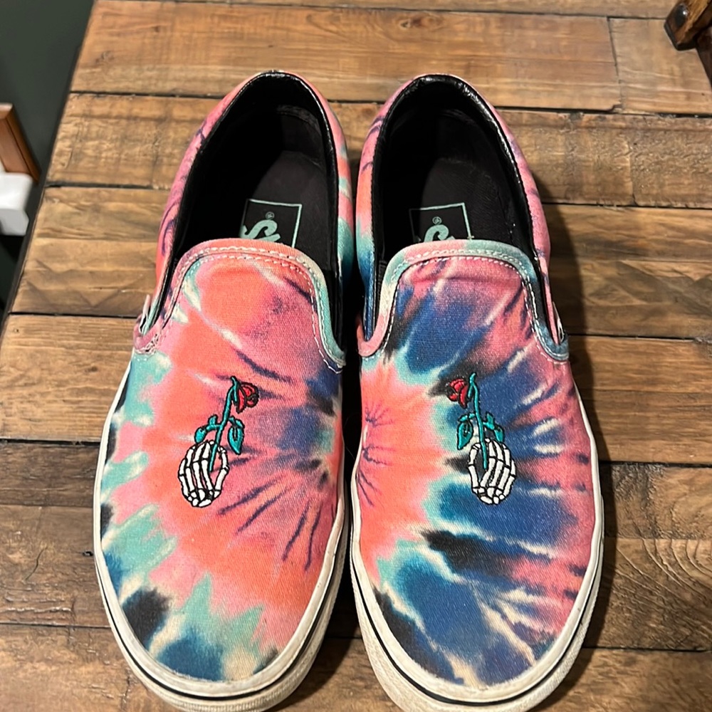 Cool colorful vans with skeleton hand holding a rose